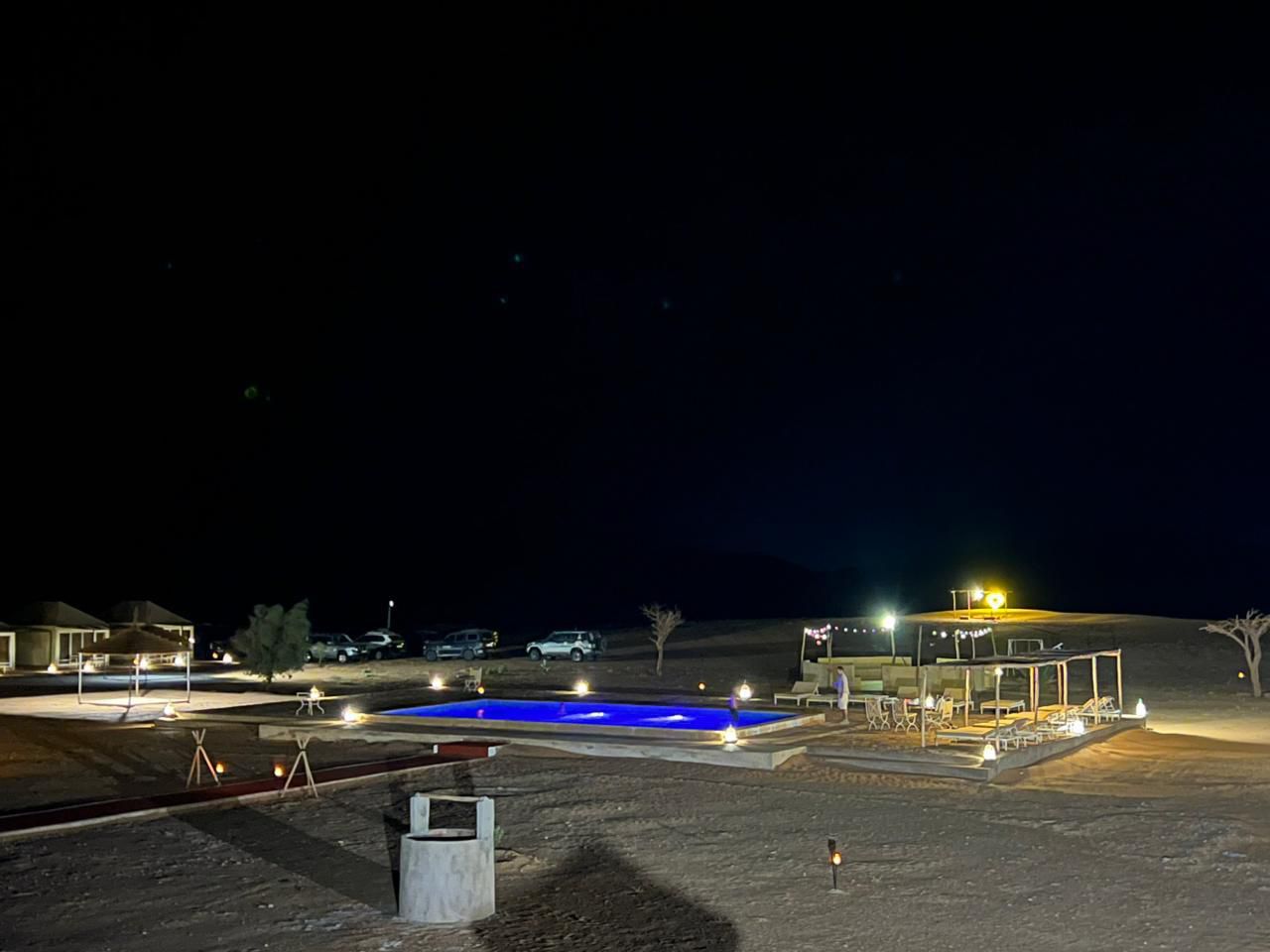 Night sky over Sahara Royal Resort pool, Merzouga